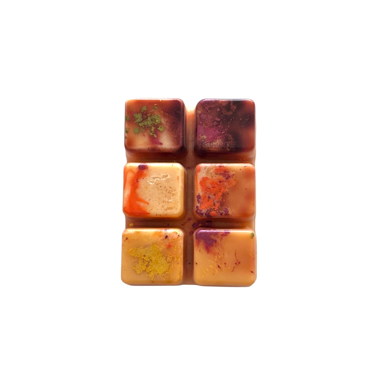 An orange-yellow colored wax melt with 6 cubed sections