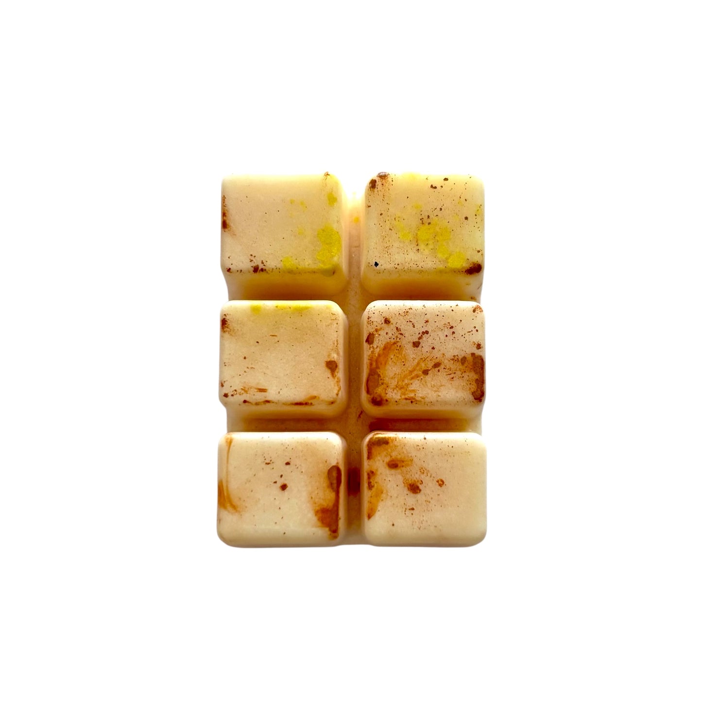 A cream colored wax melt with 6 cubed sections