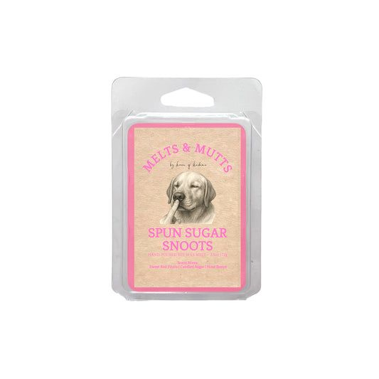 Packaged wax melt clamshell with a dog illustration and text on a white background