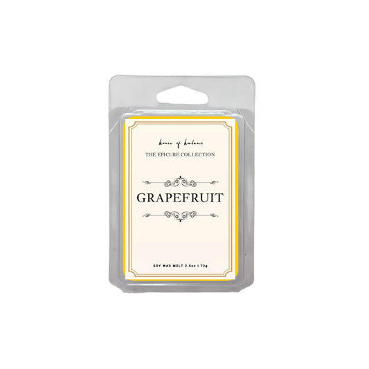 Grapefruit wax melt package with decorative label on a white background